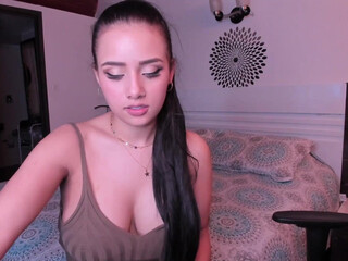 nina_mon busty babe gently caresses her pussy