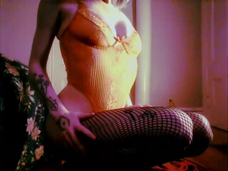 pink but does not show face