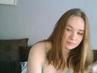 loqy_west cute young lady puts on big tits