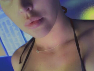 misssaintxxx hot chick with big booty poses in lingerie