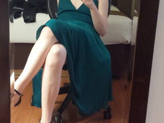 Lianna Lawson black-haired handjob lying on the couch