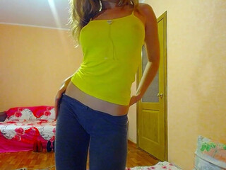 Striptease black haired babe puts big tits