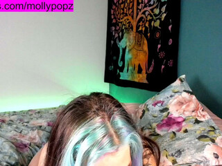 mollypopz graceful female seduces with juicy tits