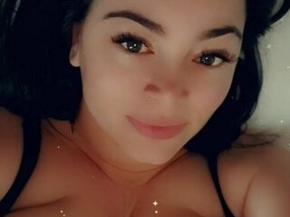 Busty Klara with a toy in the pussy