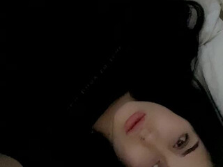 Mistress Karina caresses gorgeous boobs