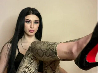 Mistress Karina Fishnet brunette