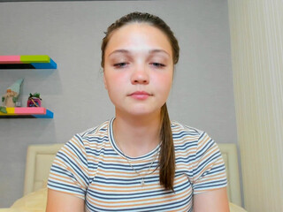 emma_fades graceful female admires beautiful tits