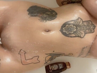 stellaraee  busty  cam girl  caresses her lips.