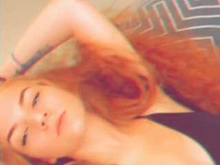 gingerteen gorgeous jerks off a banana and cums.