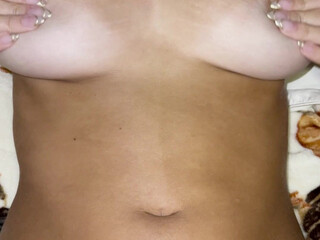 Lia Charming slut hammering herself on the couch