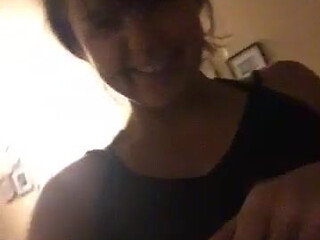 dillon harper Pretty woman sitting in a chair