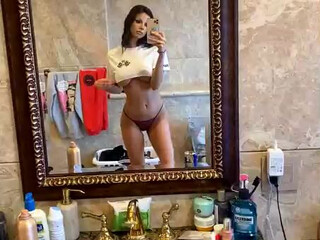 Katie Bell Young schoolgirl erotically eats a banana