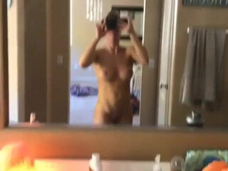 Nicole Aniston beauty in red erotic lingerie