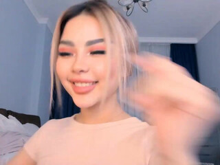 bae_suz chaturbate Busty bitch caresses her lips.