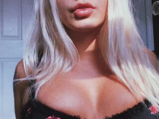 Emily Rinaudo aka Emjayplays onlyfans Doll in stockings pulls pussy with fingers